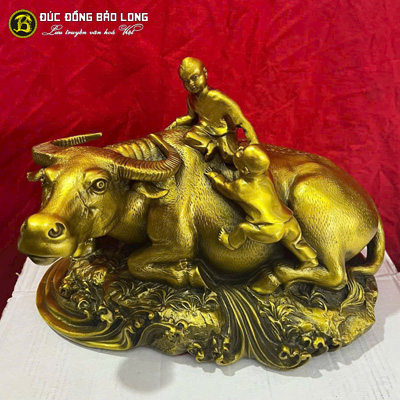 Tượng Đồng Sửu ( Trâu ) Cõng Trẻ Bằng Đồng Vàng cao 1 tấc ( 15 cm ) ở Sài Gòn TPHCM